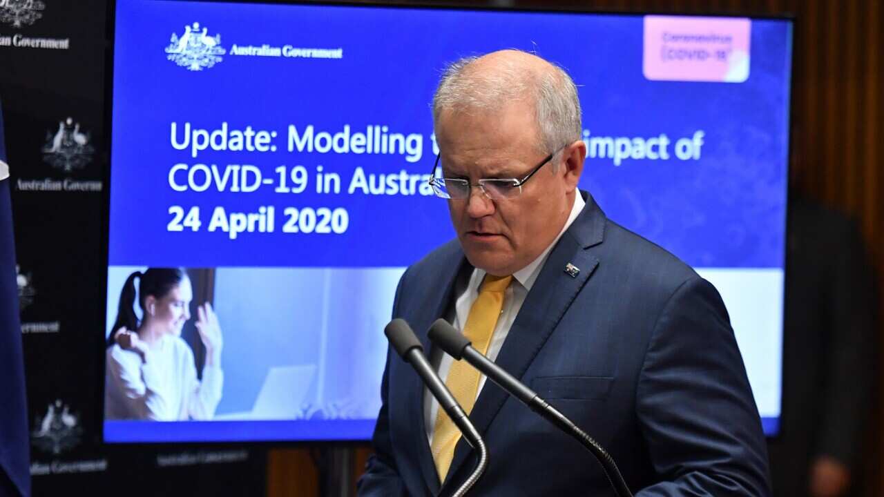 Prime Minister Scott Morrison arrives to give a coronavirus update