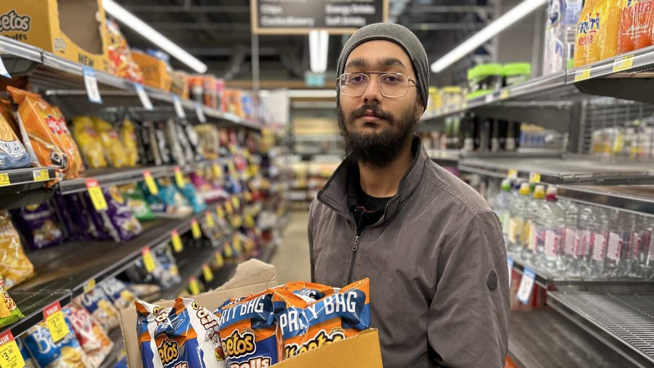 Naunihal Singh working in a Melbourne supermarket (SBS-Sandra Fulloon).jpg