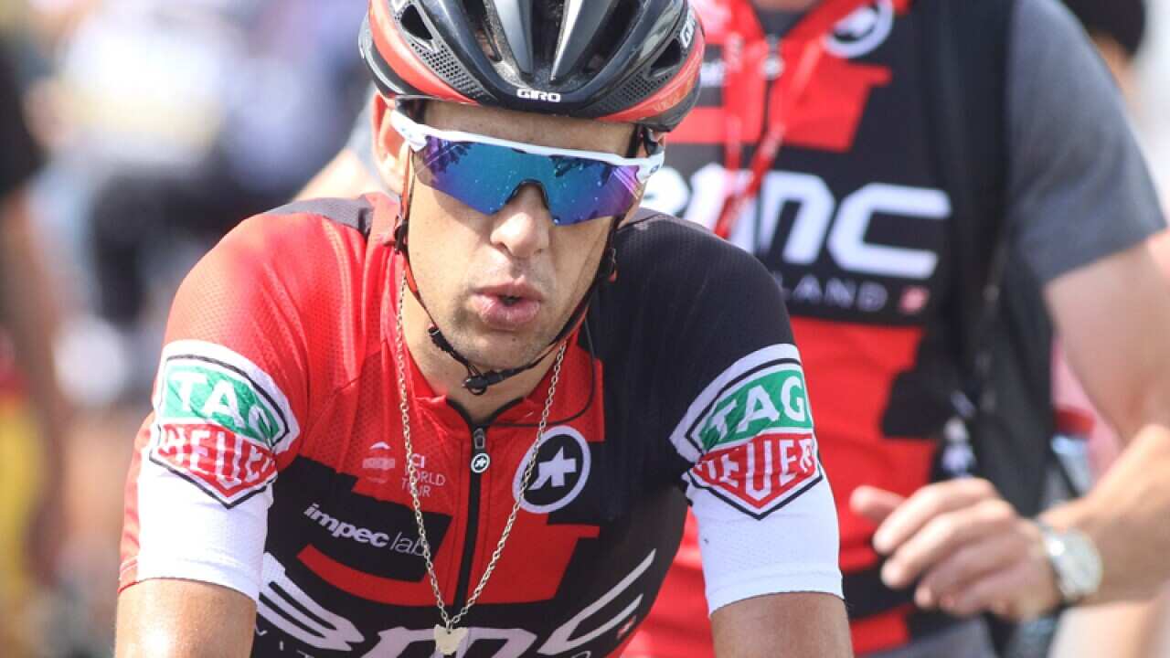 Richie Porte of BMC heads to podium