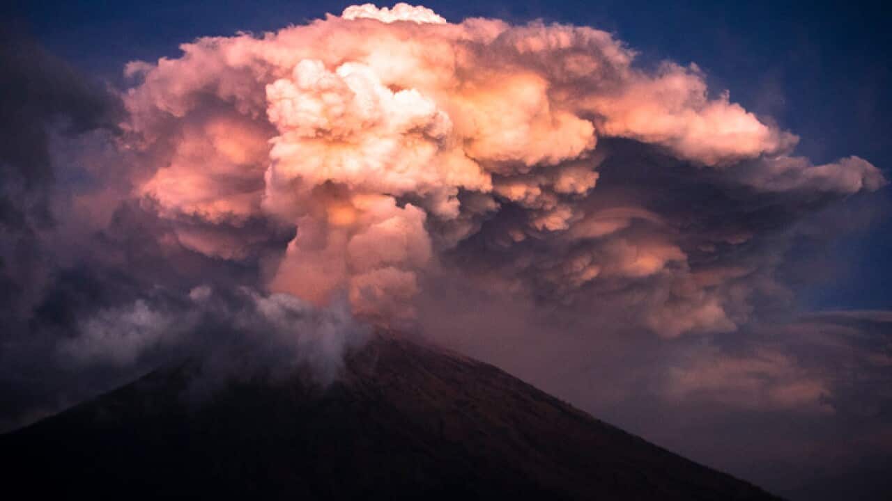 Mount Agung volcano spews hot volcanic ash into the air as seen from Kubu Village in Karangasem, Bali, Indonesia.