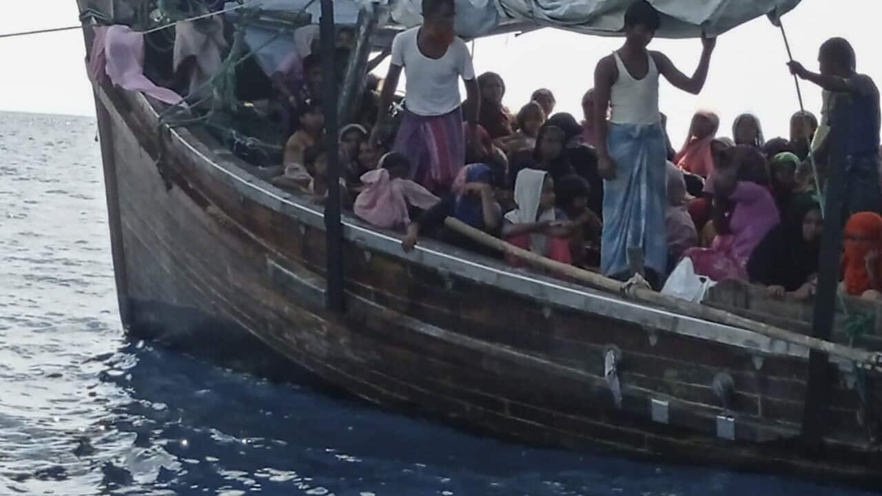 Rohingya refugees on a wooden boat off Bireuen