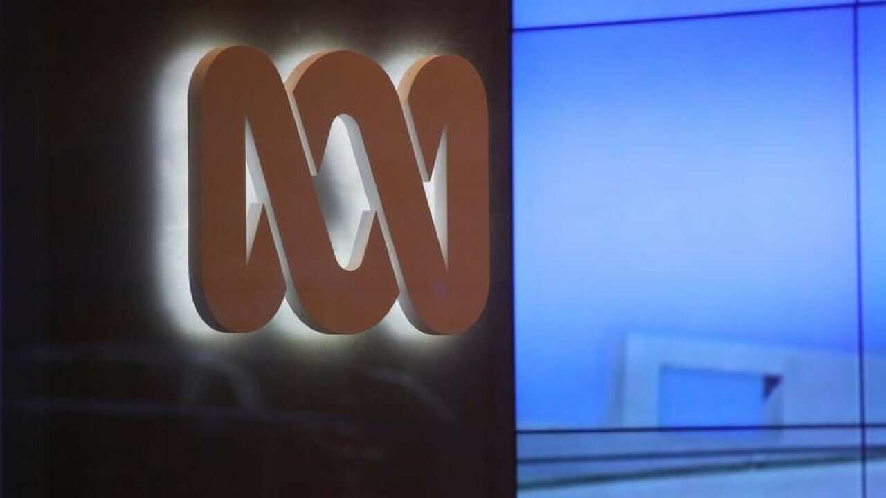The logo of the ABC can be seen next to a screen.