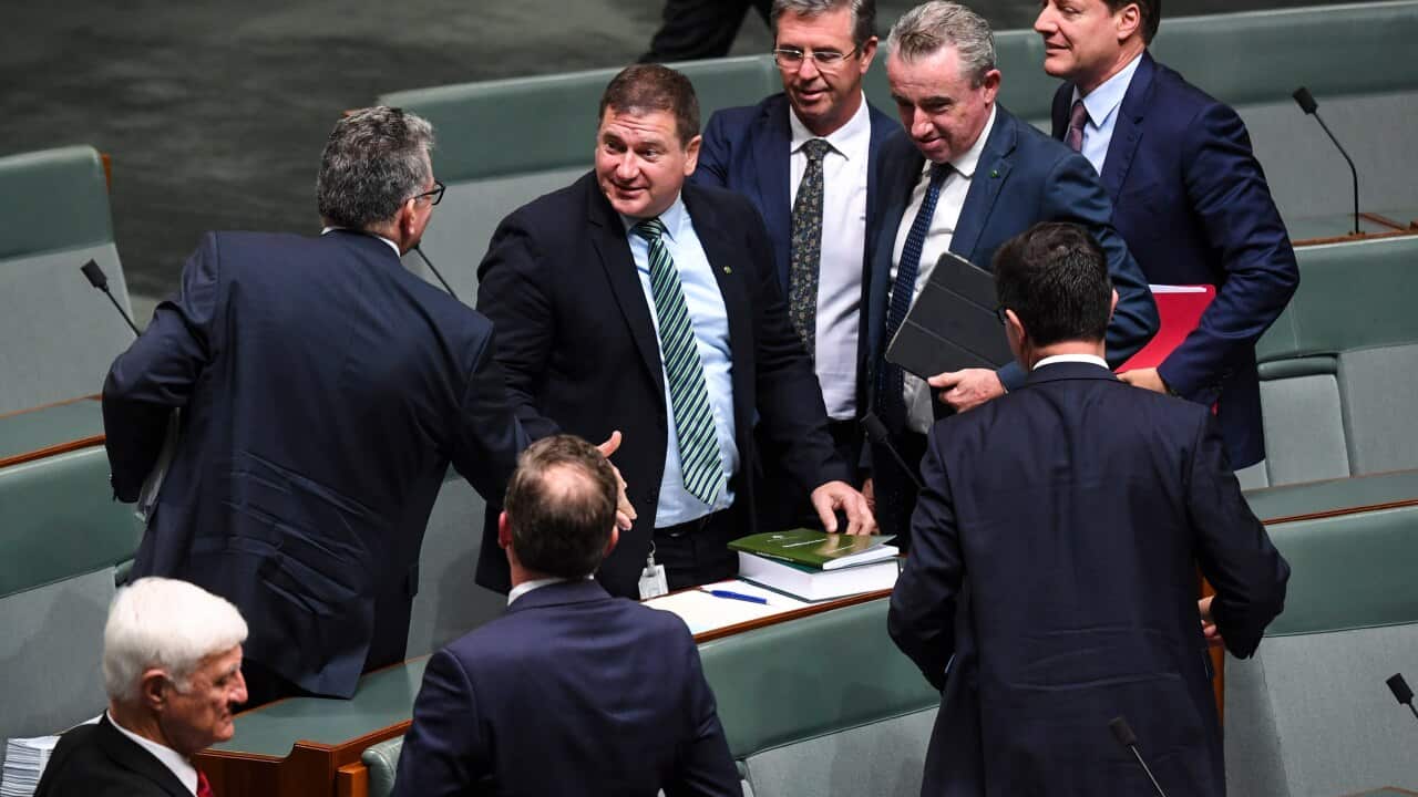 The member for White Bay Llew O'Brien (centre) is congratulated after being elected to the deputy speaker position in the House of Representatives at Parliament House in Canberra, Monday, February 10, 2020. (AAP Image/Lukas Coch) NO ARCHIVING