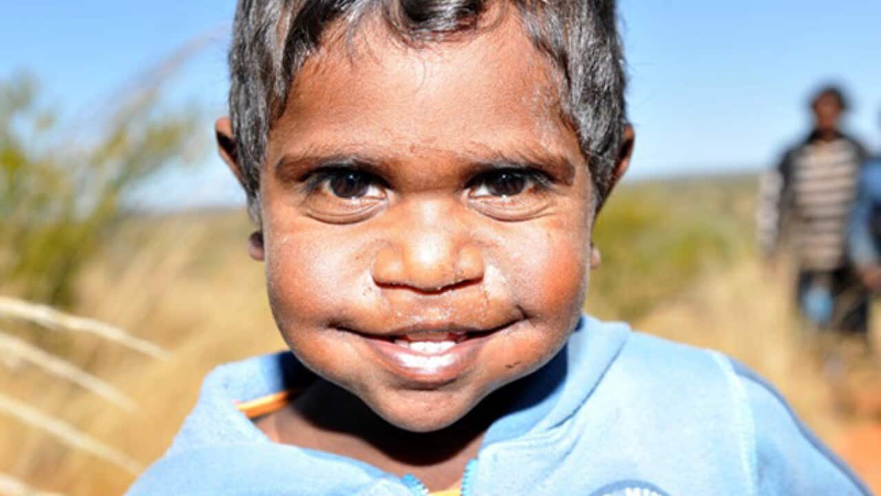 Aboriginal child blue jumper_amnesty_B_546488530