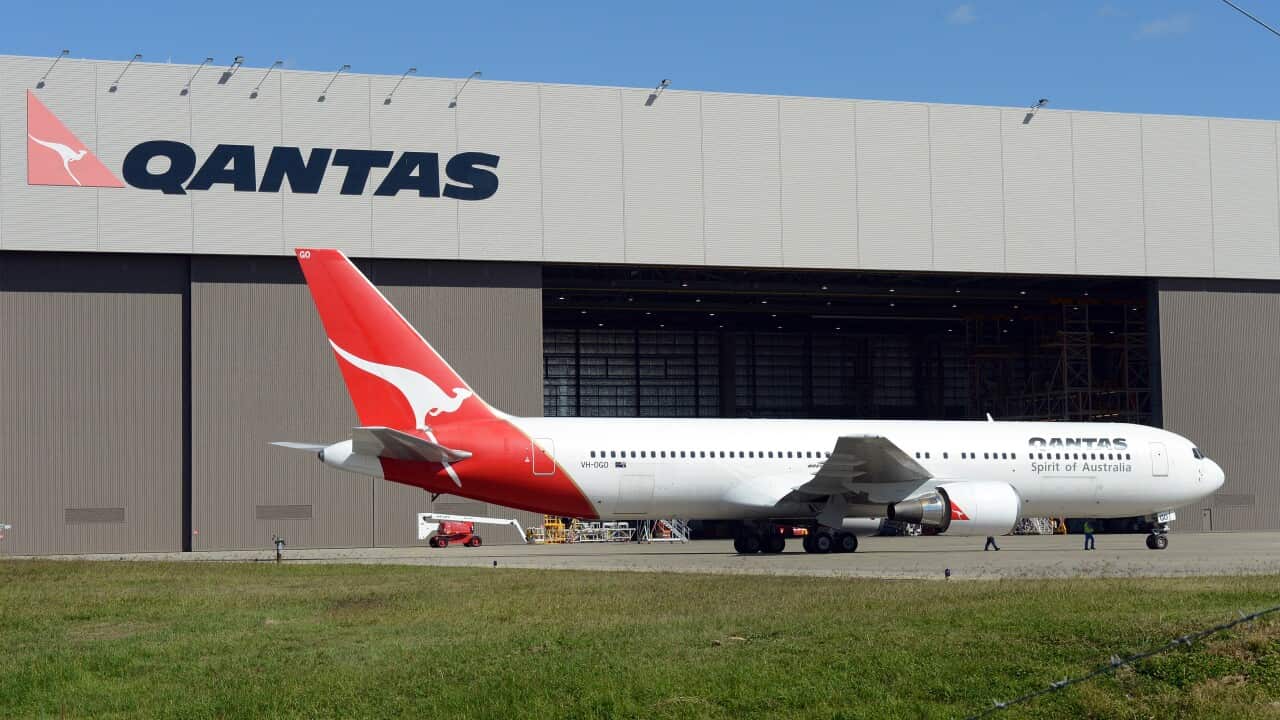 A plane at the Qantas heavy maintenance base at Brisbane airport - AAP-1.jpg