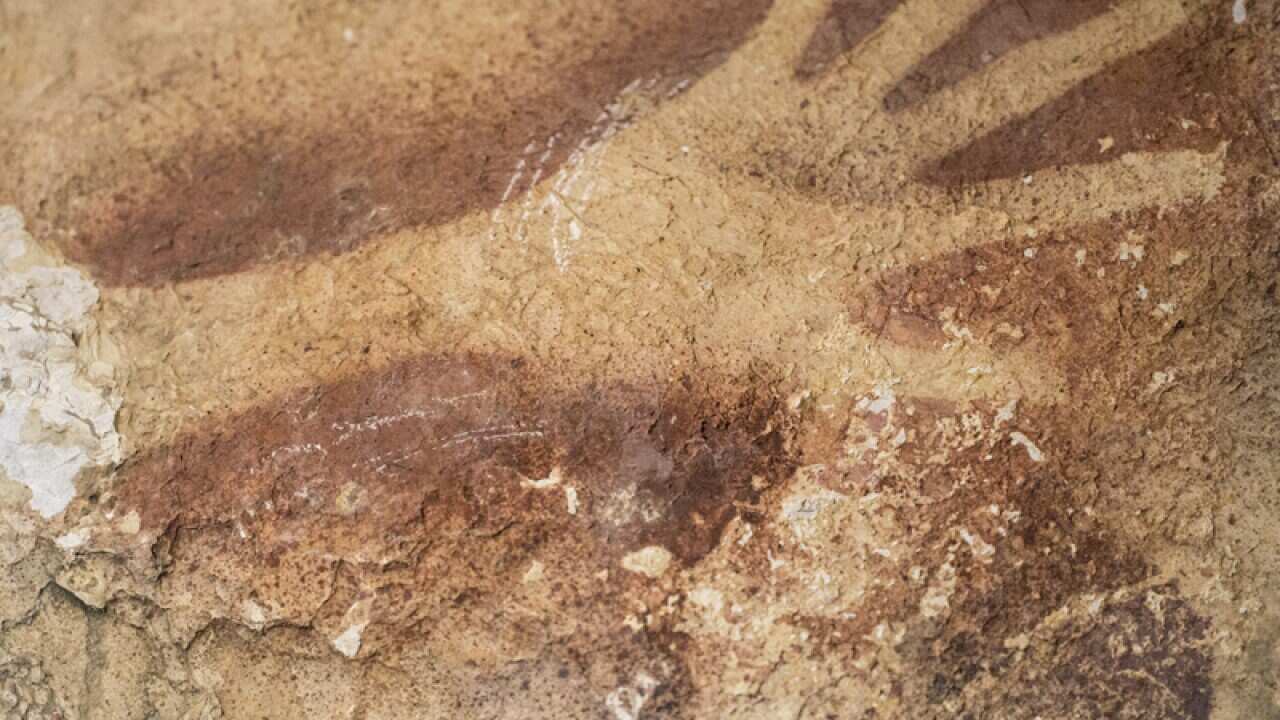 Stencils of hands in a cave in Indonesia