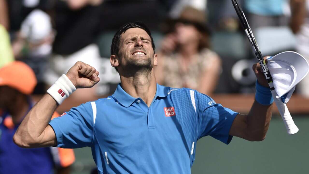 Novak Djokovic from Serbia celebrates after defeating Rafael Nadal