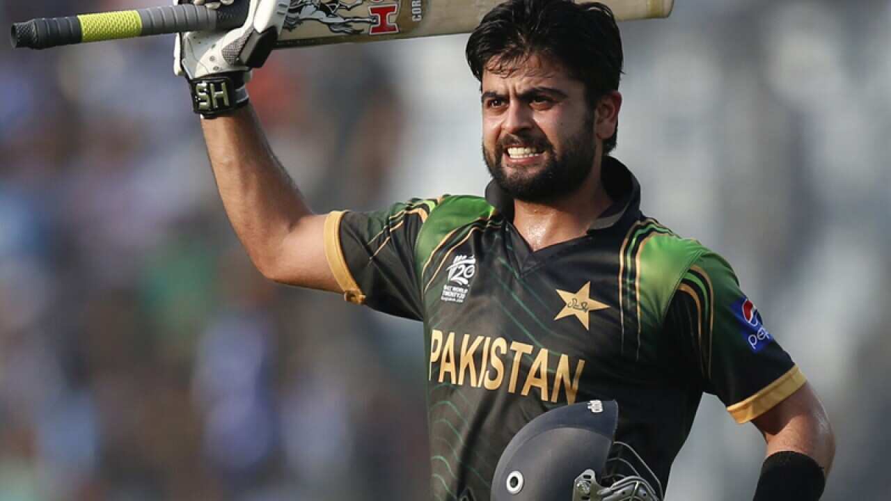Pakistan batsman Ahmed Shehzad celebrates scoring a century