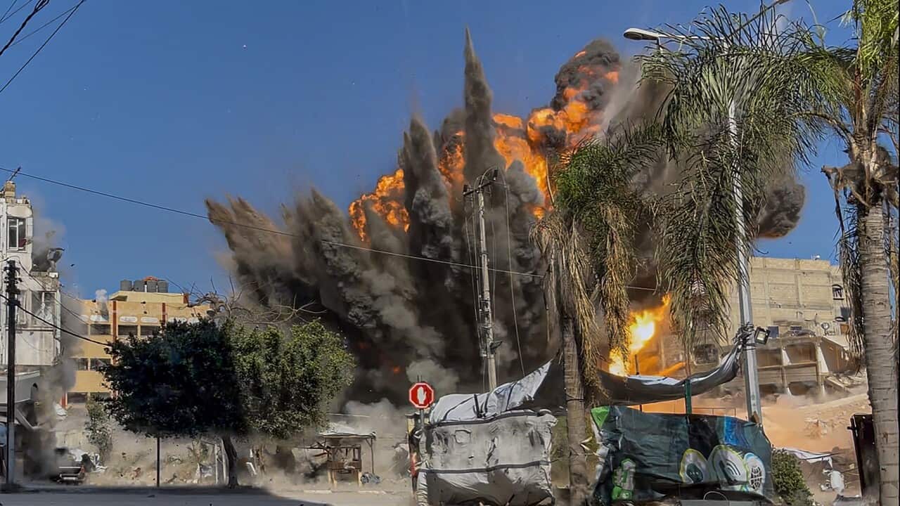 An explosion following an Israeli air strike in Gaza City