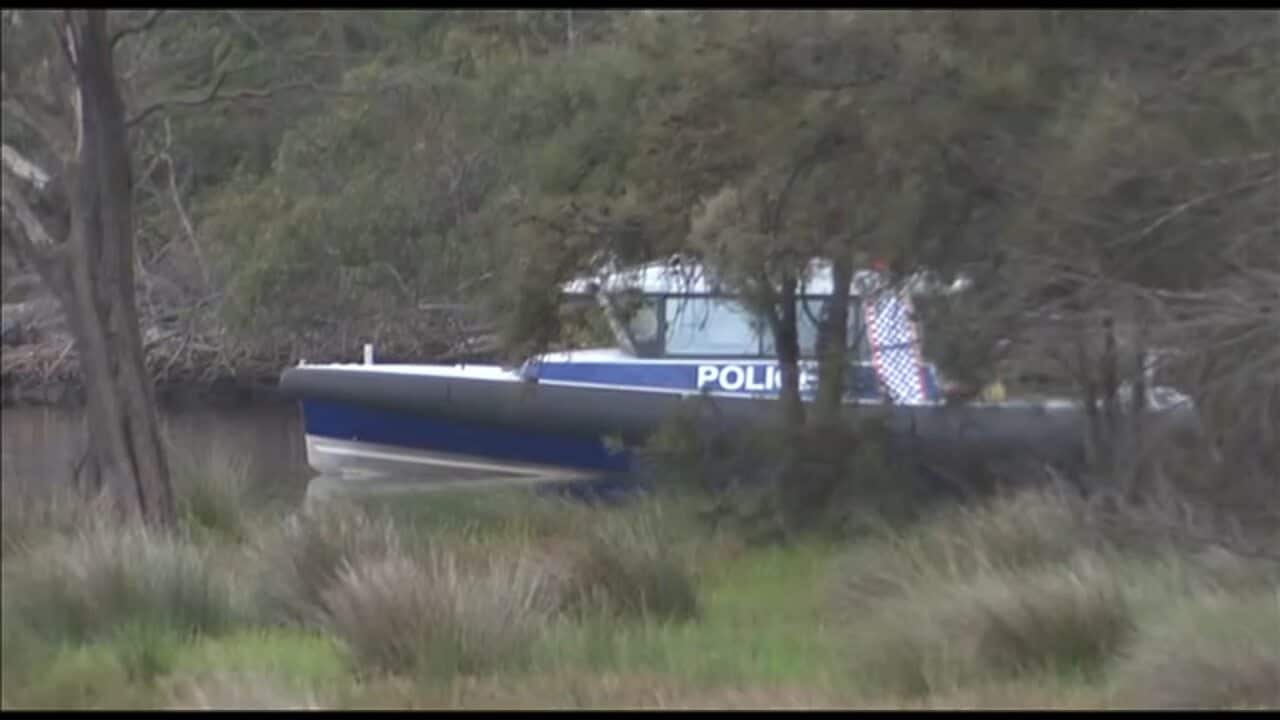 A police boat continues to search on the Swan River