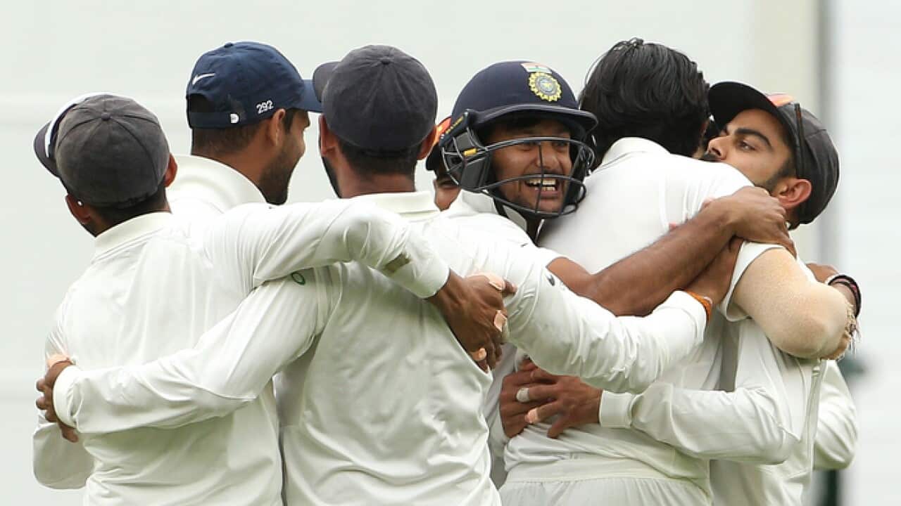 The Indian cricket team celebrates its victory over Australia in the Melbourne Test. (AAP)