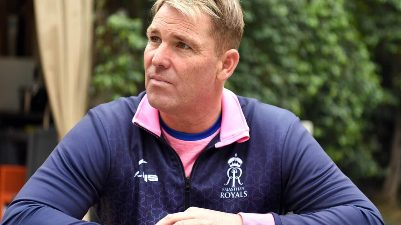 Shane Warne is sitting sitting down during an interview in 2019.