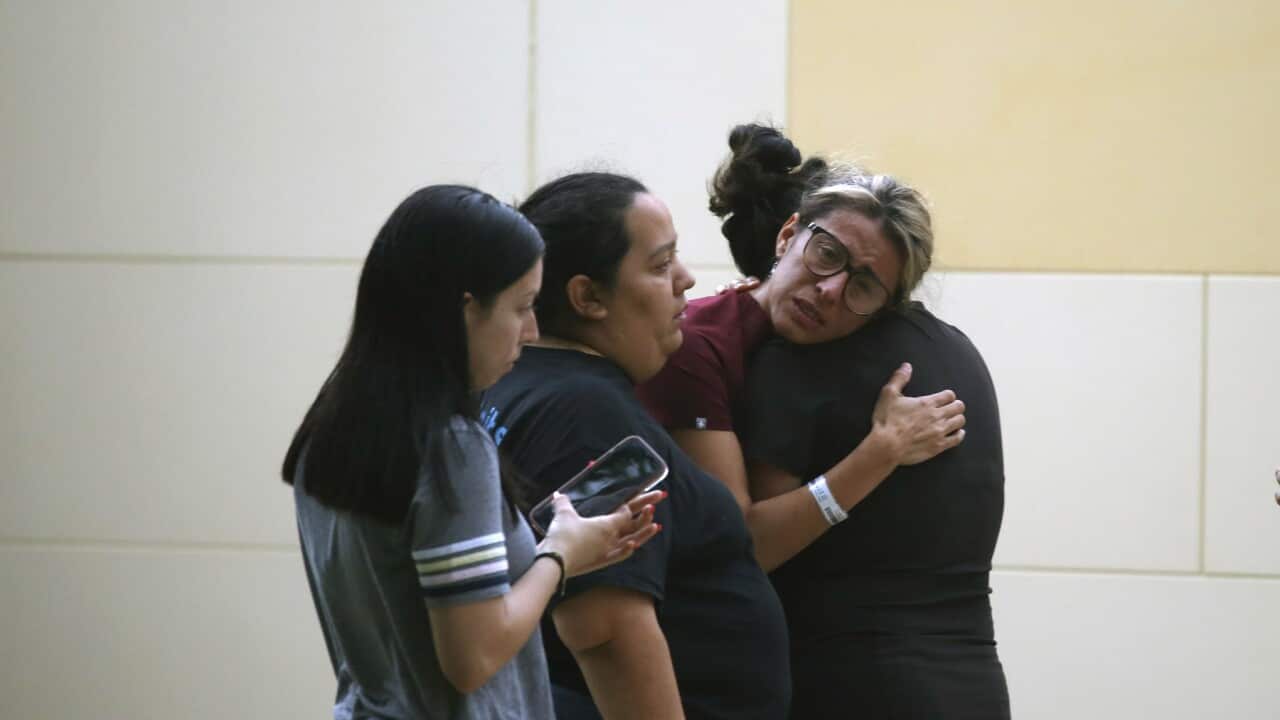People react following the deadly school shooting in Texas