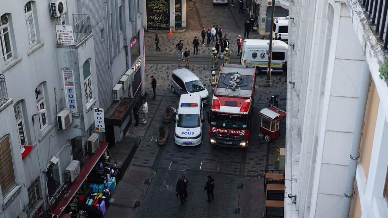 Police officers cordon off the scene of the explosion in Istanbul
