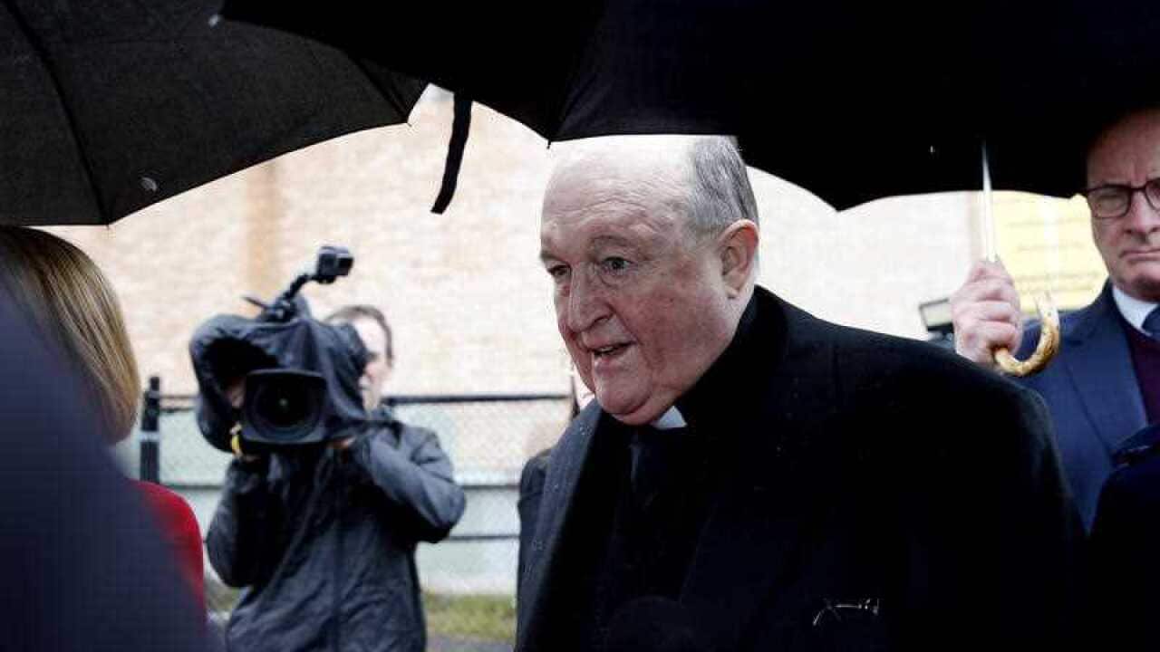The Archbishop of Adelaide, Philip Wilson leaves Newcastle Local Court