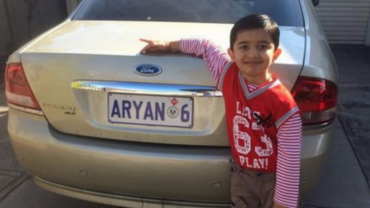 Gauragg Bavishi's son Aryan with the personalised number plate cancelled by Department of Planning, Transport and Infrastructure