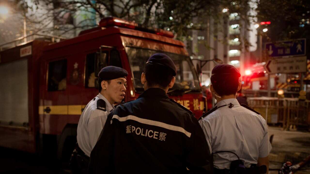 Police seen near the site of a WWII bomb discovery in Hong Kong