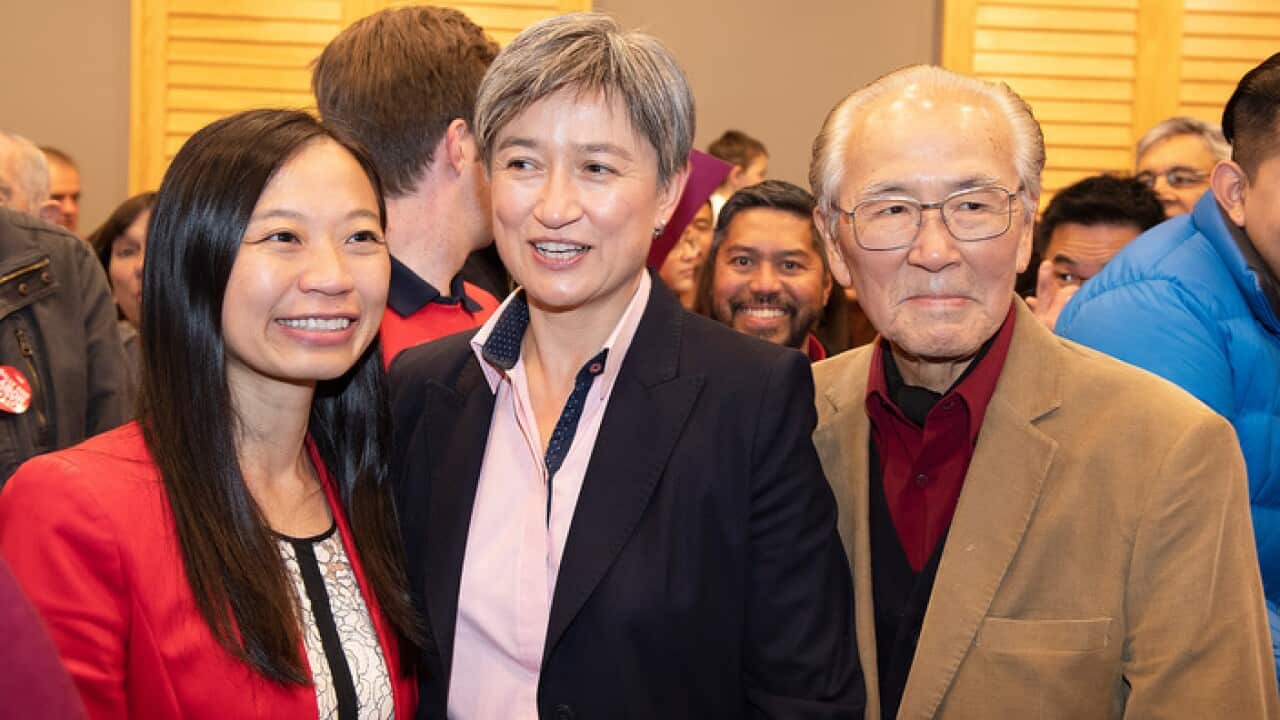 Labor candidate for Chisholm Jennifer Yang, Senator Penny Wong and Senator Wong's father Francis Wong during Ms Yang's campaign launch.