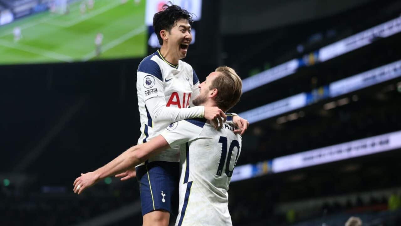 Son Heung-min celebrates a goal with Harry Kane