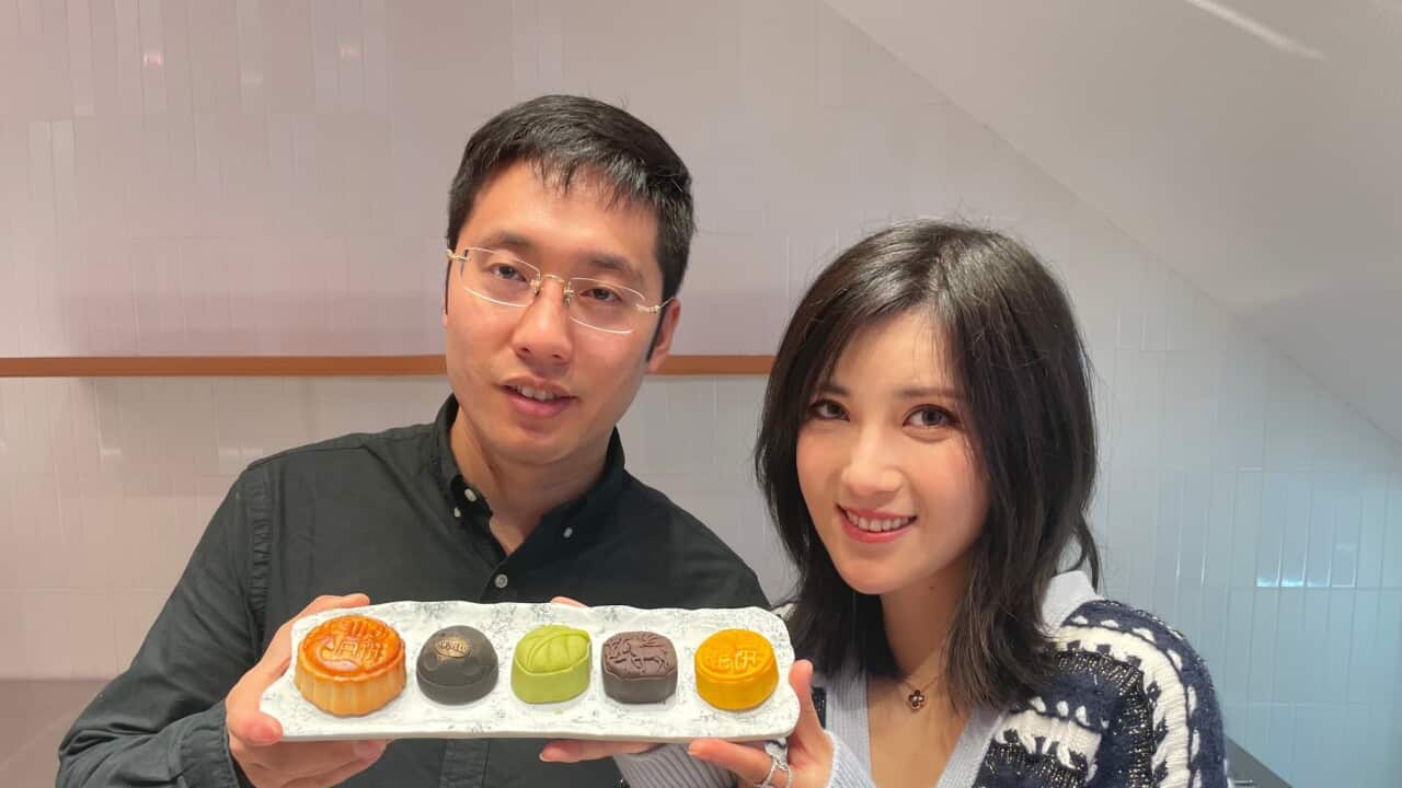 Steve Hou and Lucy Lu with some of their mooncakes at SweetLu
