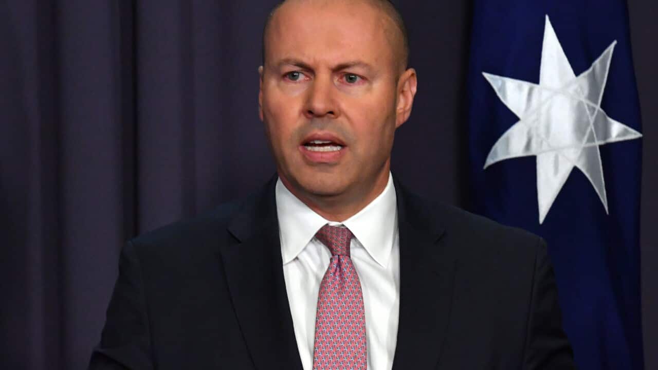 Federal Treasurer Josh Frydenberg is seen speaking.