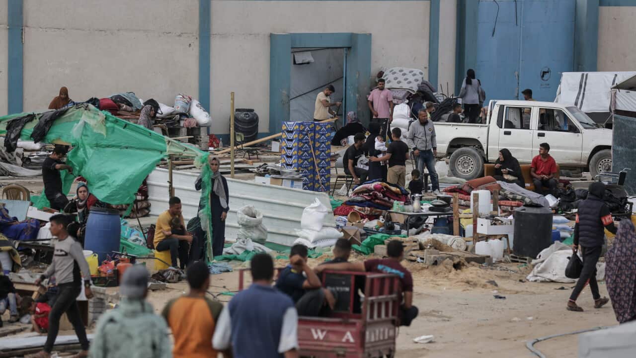 Strike on evacuation zone kills 21 people, Gaza authorities say, as Israel denies involvement