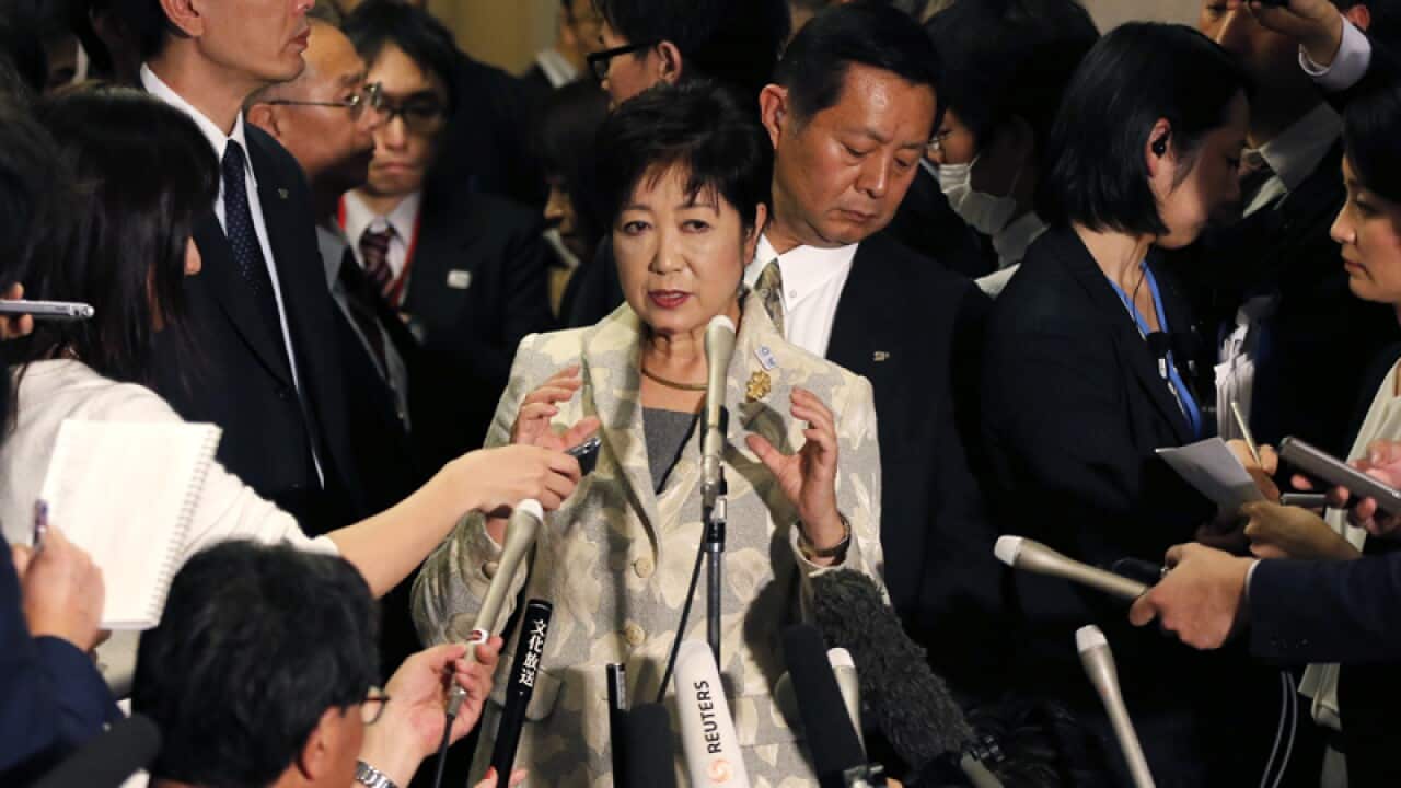 Tokyo Governor Yuriko Koike (C) after an IOC debriefing