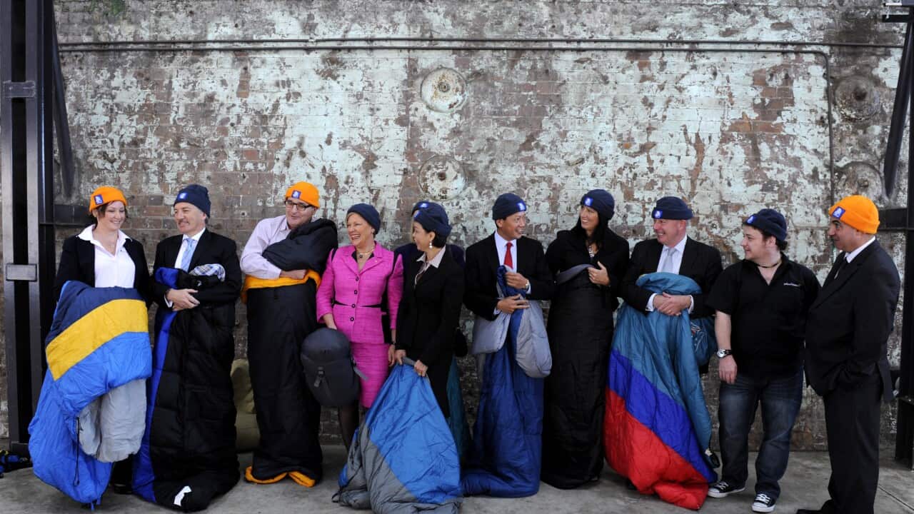 CEOs pose for a photograph for the St Vincent de Paul Society annual CEO Sleepout in Sydney, Tuesday, May 1, 2012. (AAP)