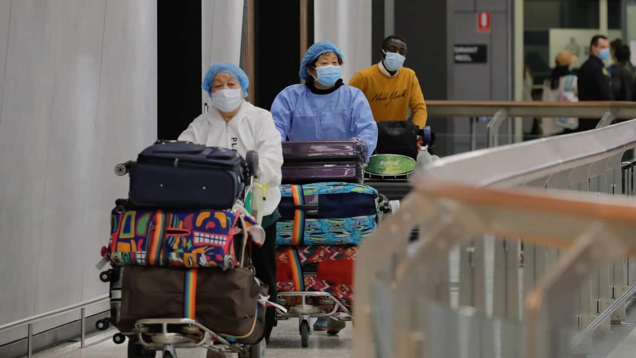 Passengers are seen arriving at Melbourne International Airport in Melbourne,