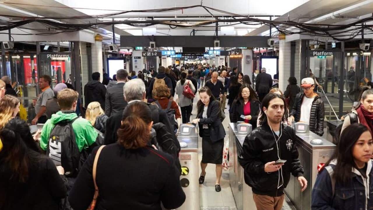 Commuters at Sydney's Town Hall railway station.