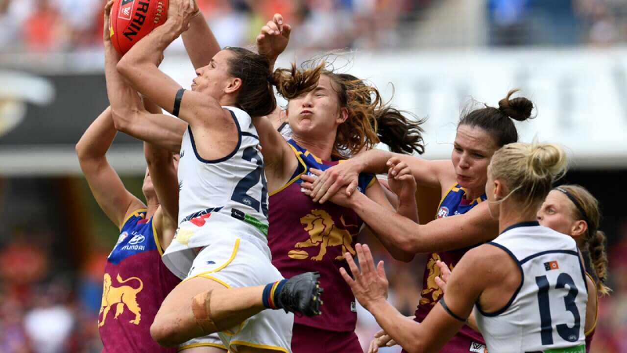 Sarah Perkins of the Adelaide Crows jumps for a high ball