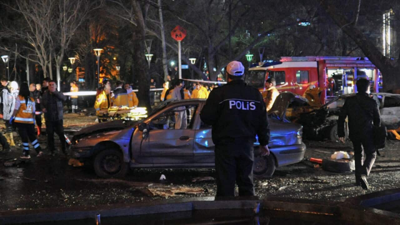 Police secure an area after an explosion in Ankara