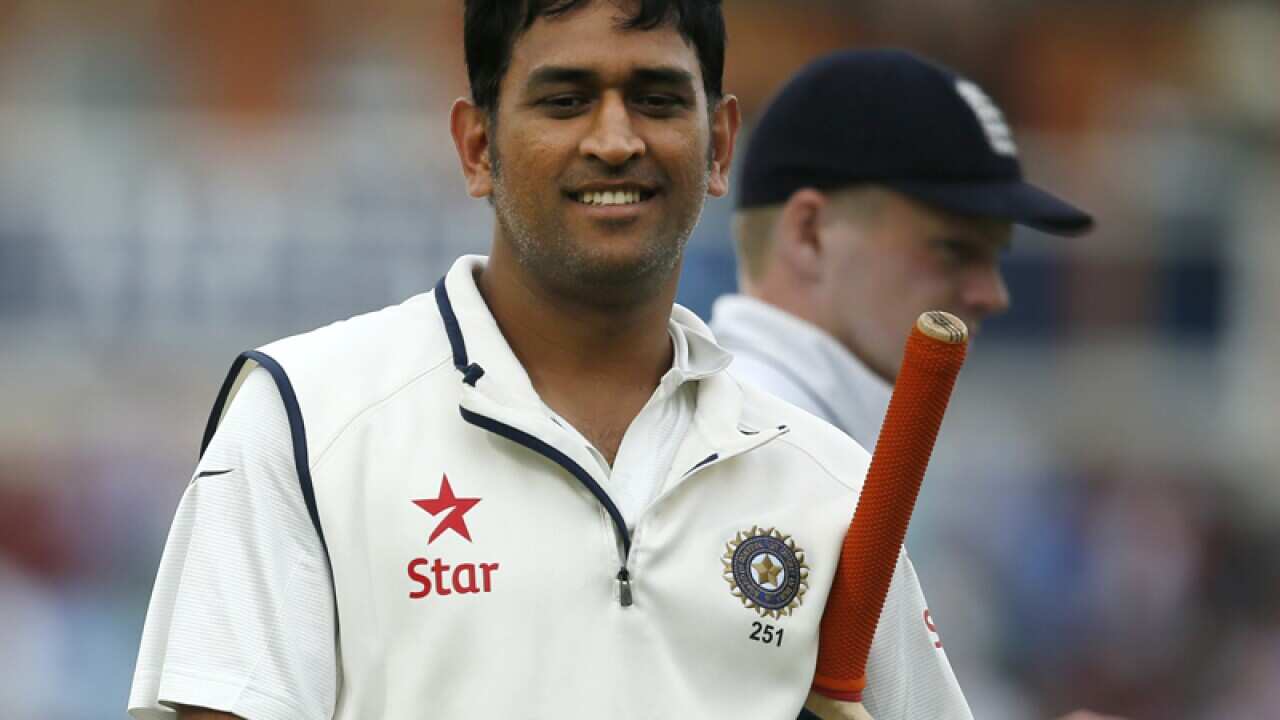India's MS Dhoni smiles