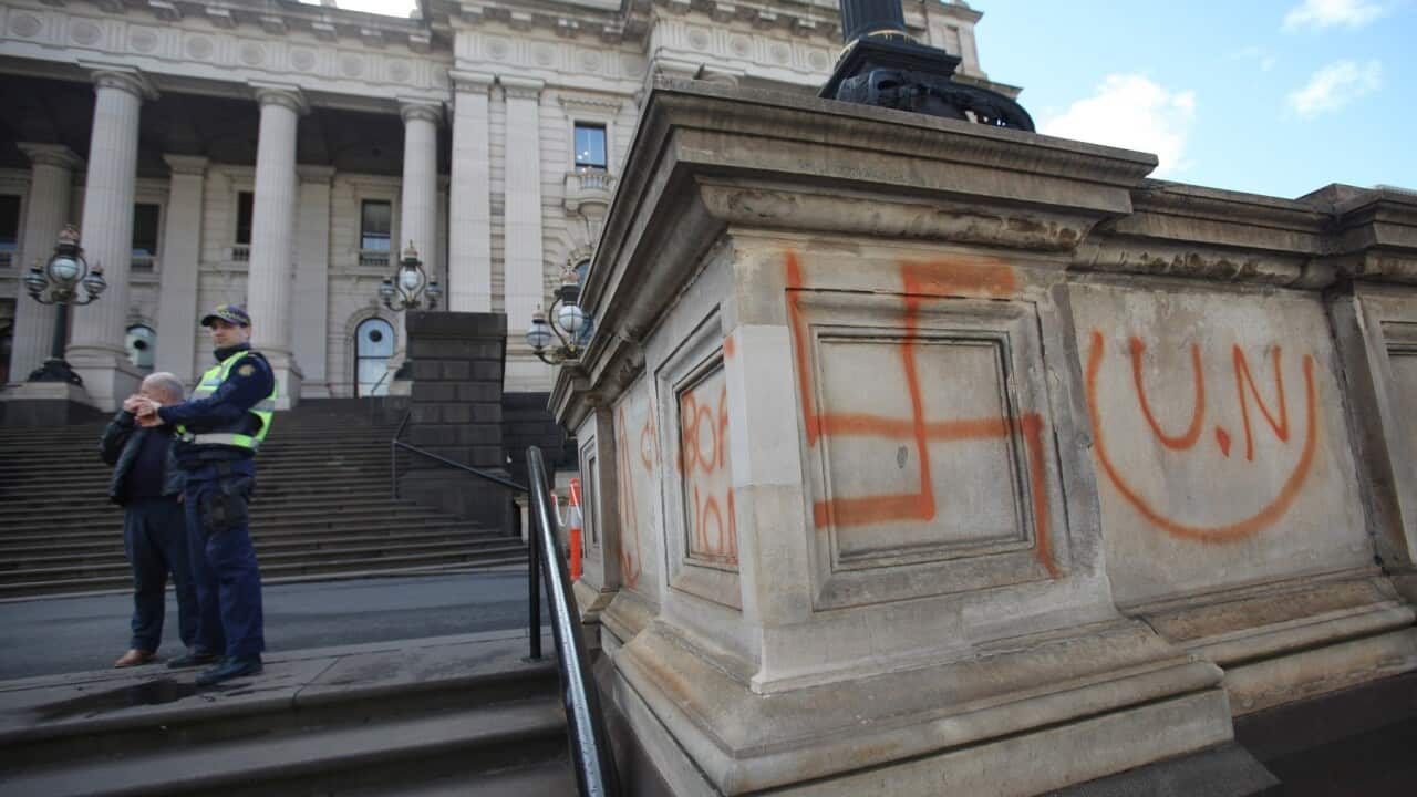 A Nazi swastika graffitied on the front of the Victorian State Parliament in 2012
