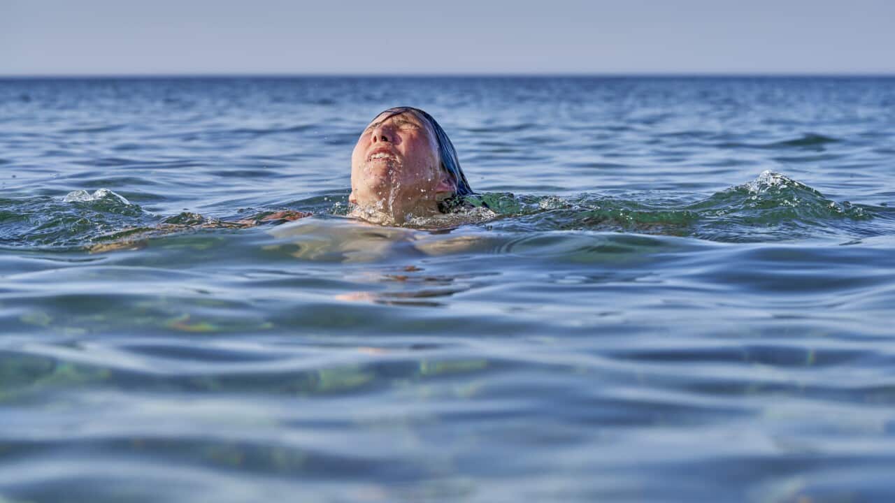 Adult women refreshment relaxation splashing into summer activity at beach Beach safety