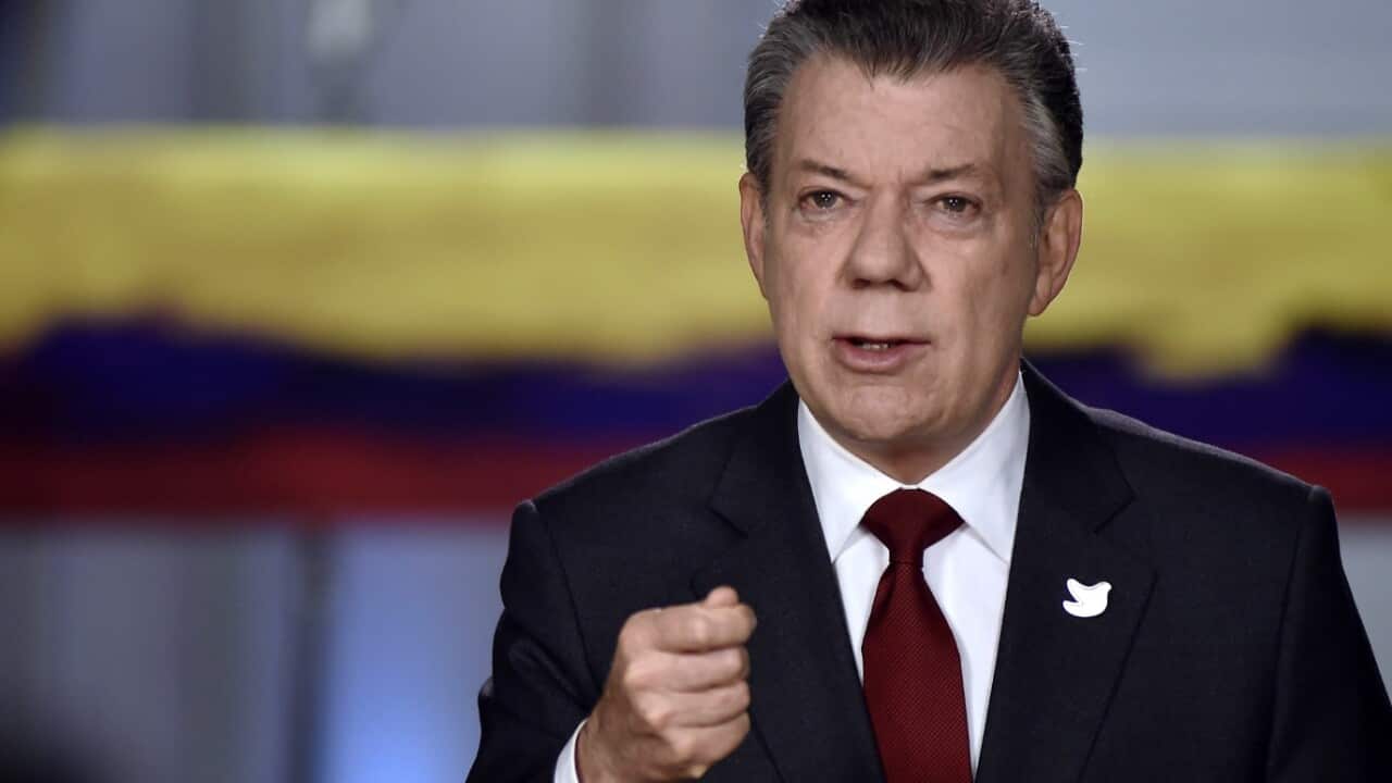 A handout picture made available by the Presidency of Colombia shows President of Colombia Juan Manuel Santos