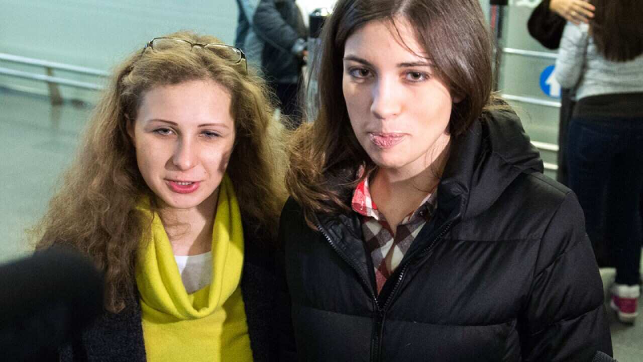 Pussy Riot members Maria Alyokhina (L) and Nadezhda Tolokonnikova