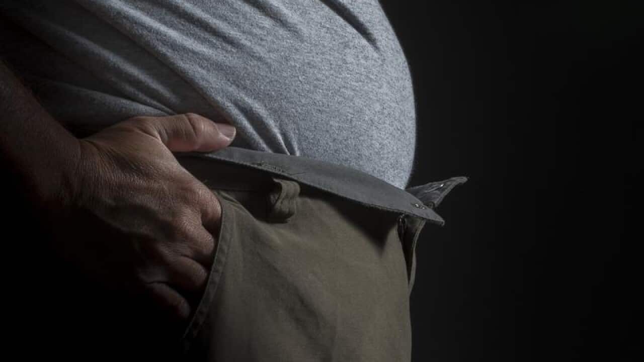 A file image of a close up of a man's waistline in Brisbane.