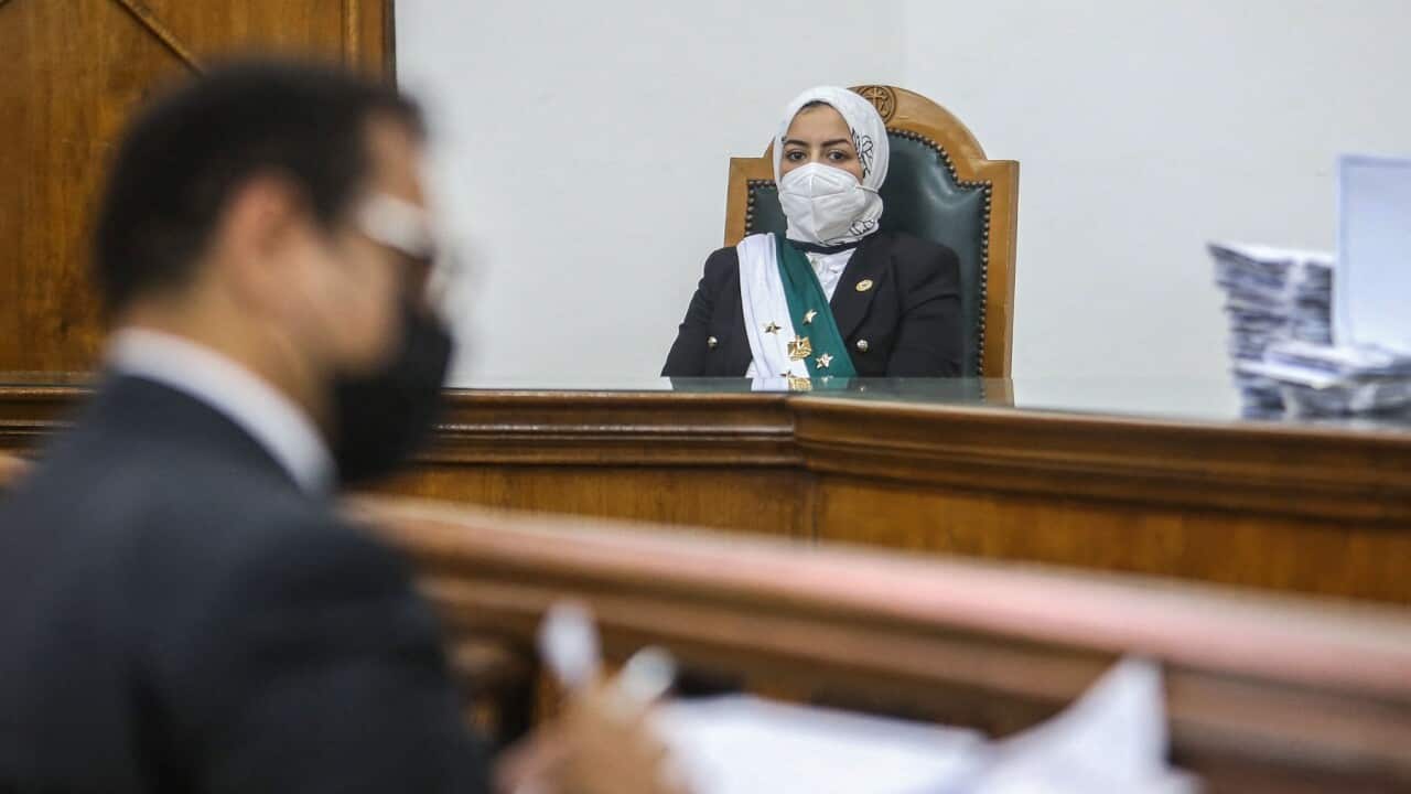 Egyptian female judge Radwa Helmi Ahmad sits on her first court hearing
