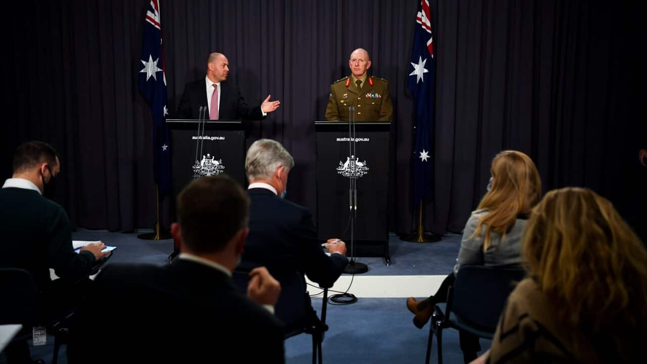 Treasurer Josh Frydenberg (left) and COVID-19 Taskforce Commander Lieutenant General John Frewen