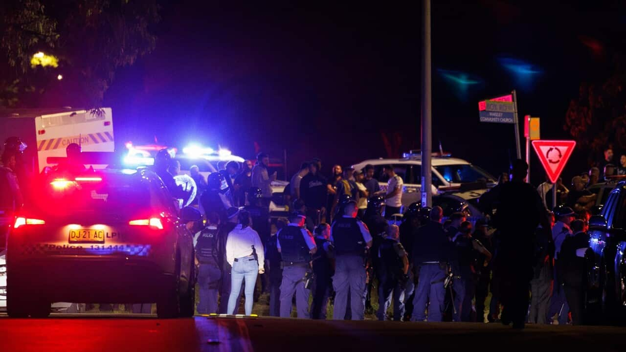 Police officers and vehicles arrive at the Christ The Good Shepherd Church in the suburb of Wakeley in Sydney.