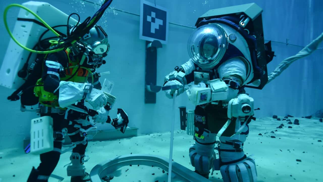 As part of a test series occurring in the Neutral Buoyancy Lab (NBL) at Johnson, astronauts in a demonstration version of the exploration spacesuit and engineers in “hard hat” dive equipment are simulating several different tasks crew could do on the moon