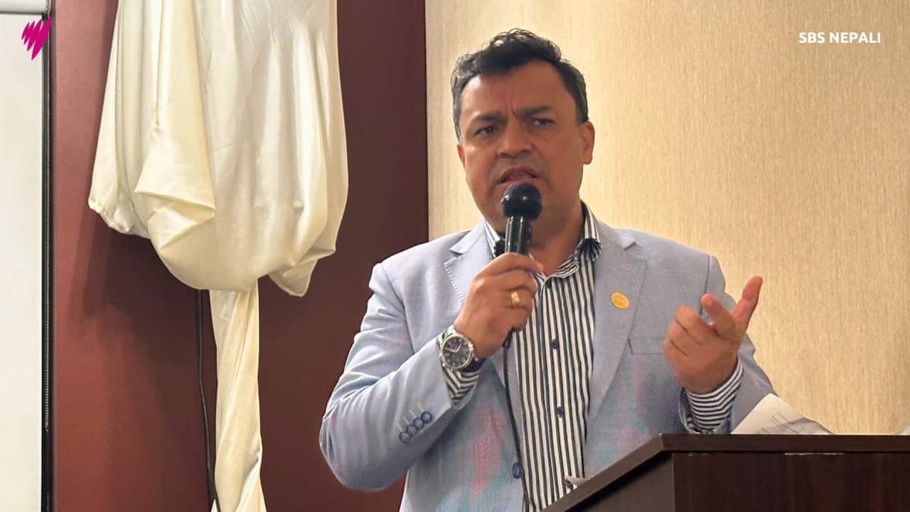Non-Resident Nepali Association's International Coordination Council (NRNA ICC) president Badri K.C. (R) speaking at the community program organised by NRNA Victoria in Melbourne on Thursday, 19 September 2024.