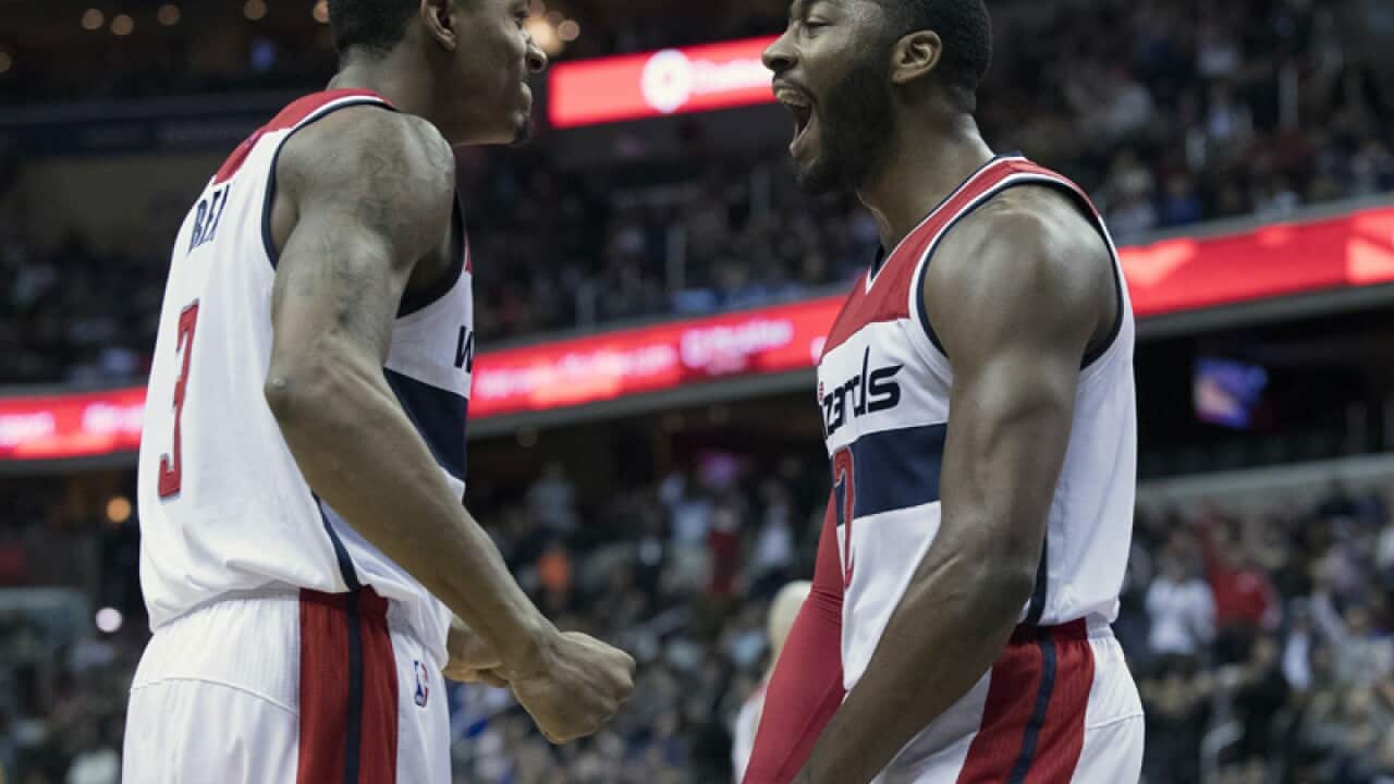 Washington Wizards' John Wall (R) and Bradley Beal