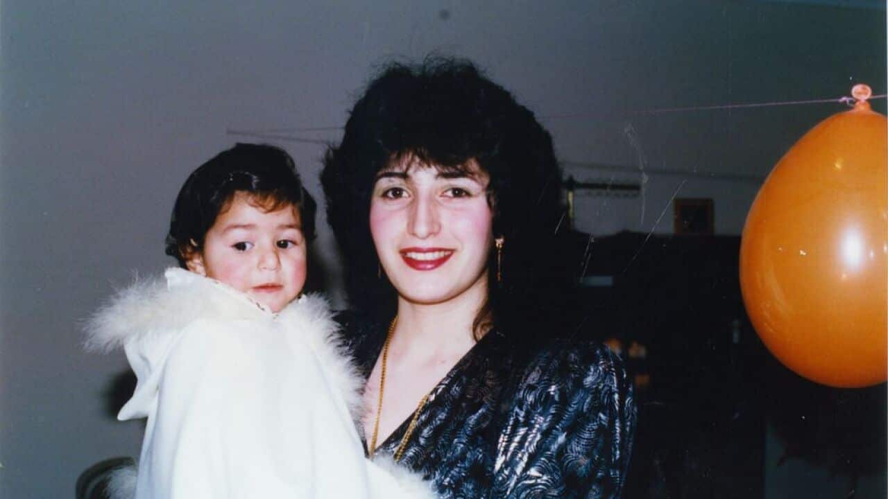 Amani and her mum on Amani's first birthday. Taken in 1989 at their home in Arncliffe.
