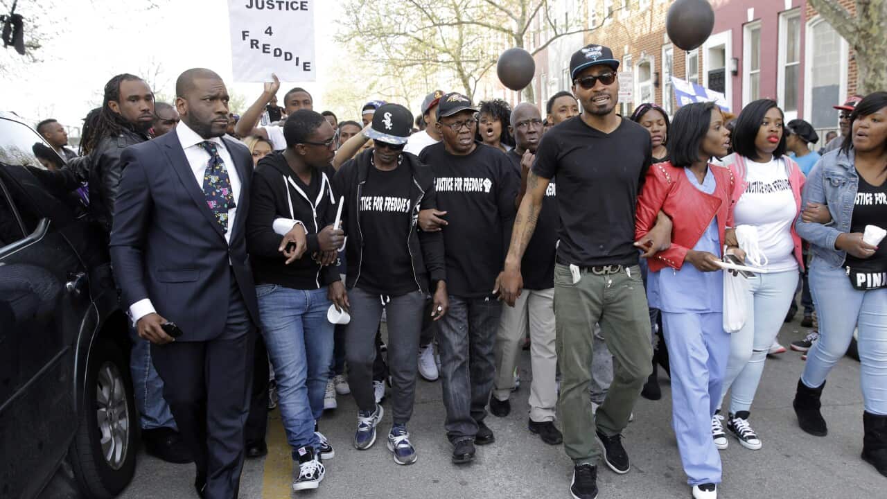 Supporters and family members of Freddie Gray lead a march to the Baltimore Police Department, Tuesday, April 21, 2015. (AP Photo/Patrick Semansky)