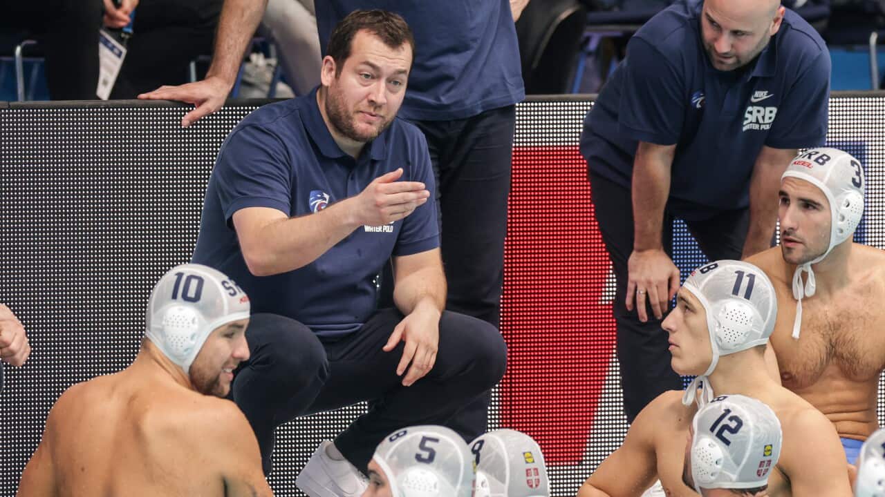 Serbia Water polo team headcoach Uros Stevanovic talks to players during the Men's European Water Polo Championship match between Serbia and Germany in Zagreb