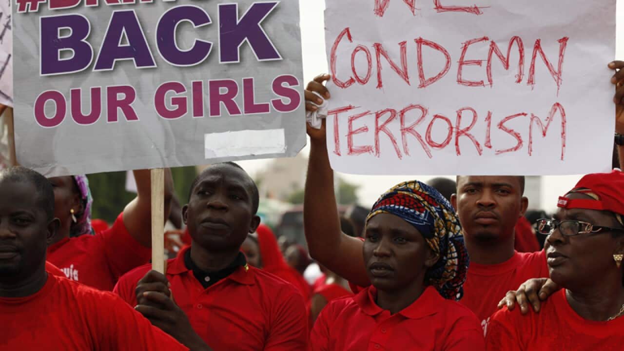 People demonstrate calling for the rescue of Nigerian schoolgirls
