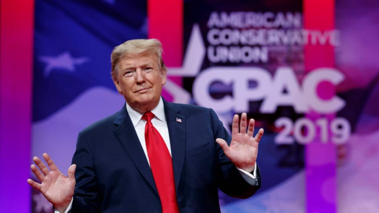 President Donald Trump cheering the crowd