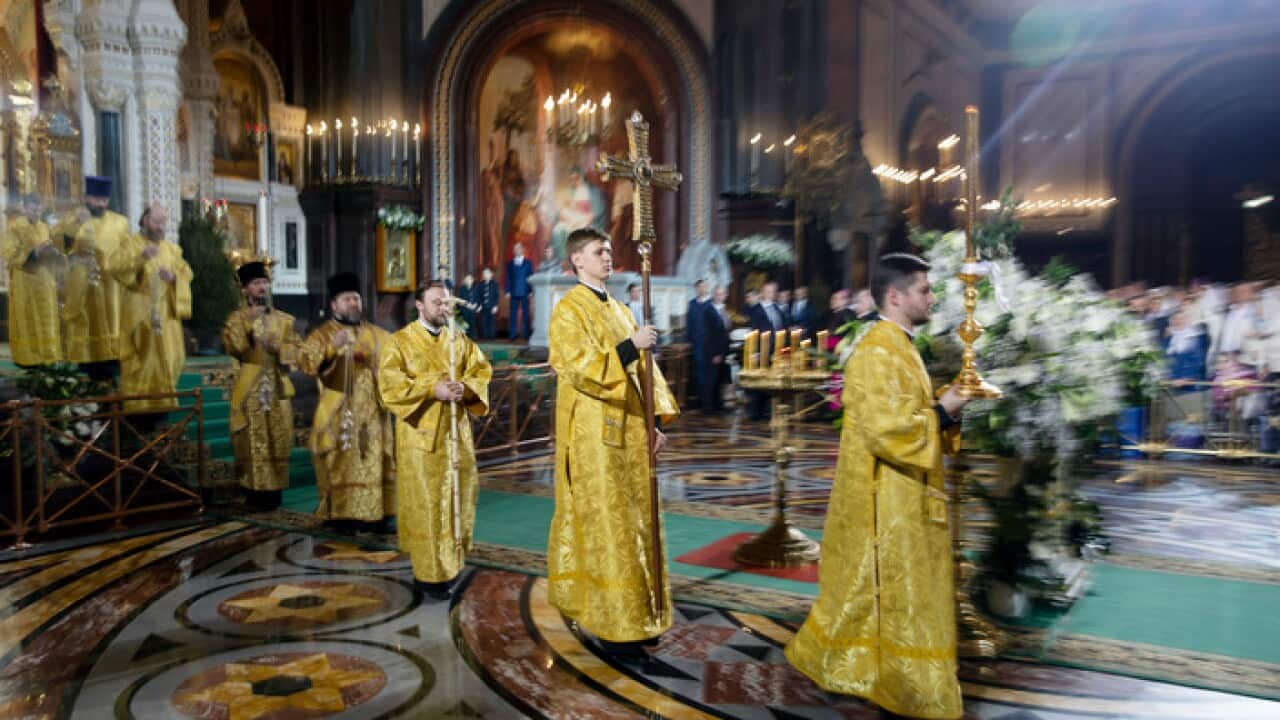 Russian Orthodox priests attend the Christmas Mass in the Christ the Saviour Cathedral in Moscow.